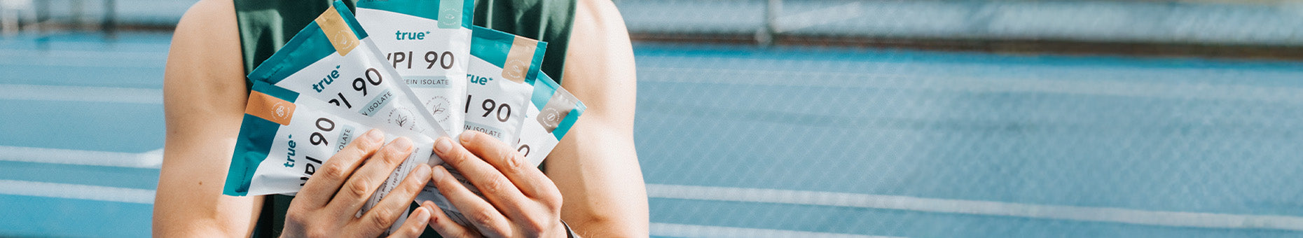 True whey protein concentrate being used after training session outdoors