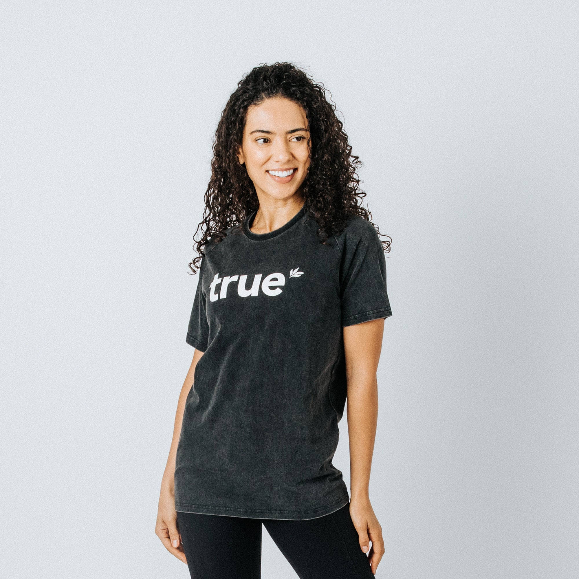 Woman wearing charcoal mineral-wash "true" logo t-shirt, women&