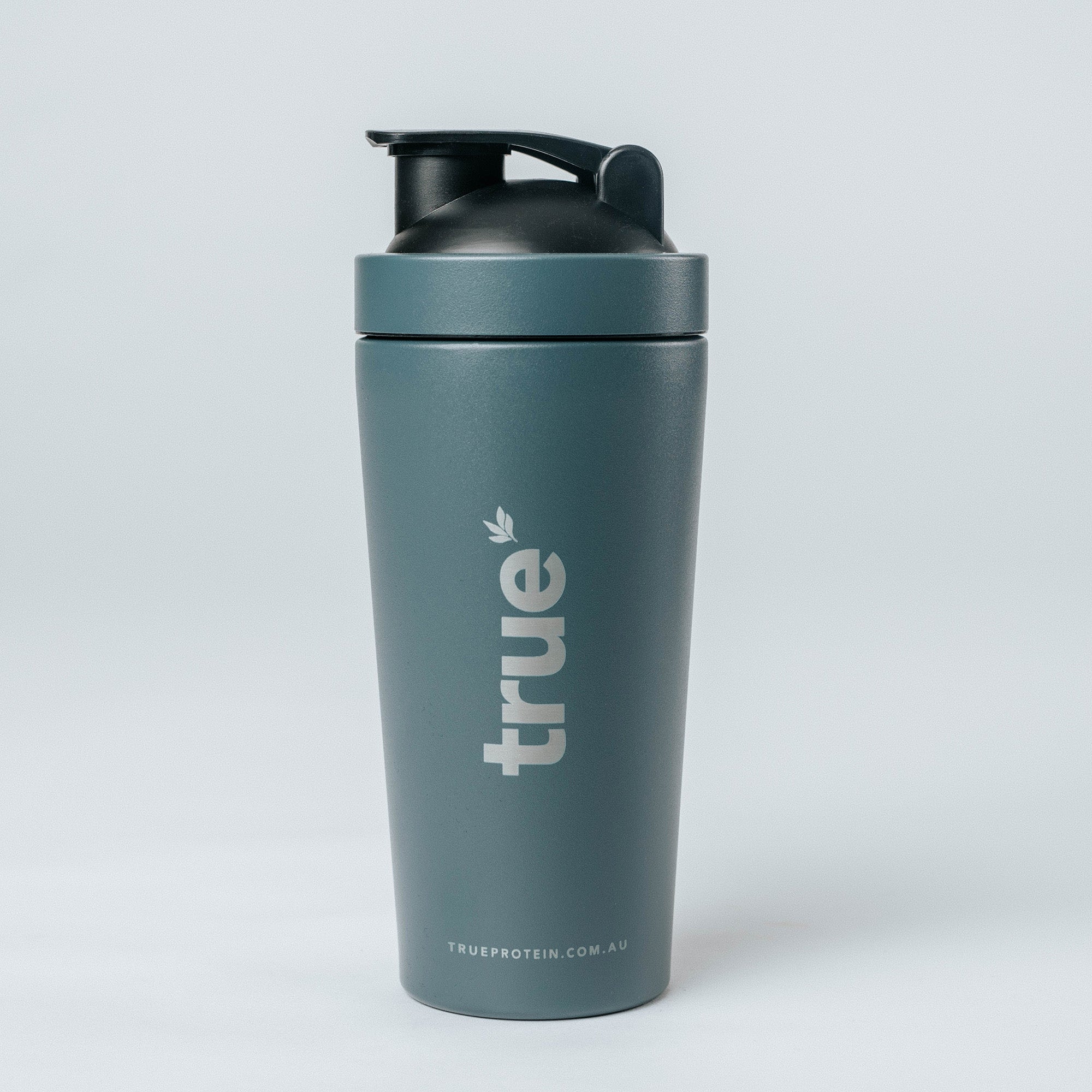 Navy True Protein stainless steel shaker bottle with black flip lid and vertical "true" logo, product image for TrueProtein.com.au (Australia)