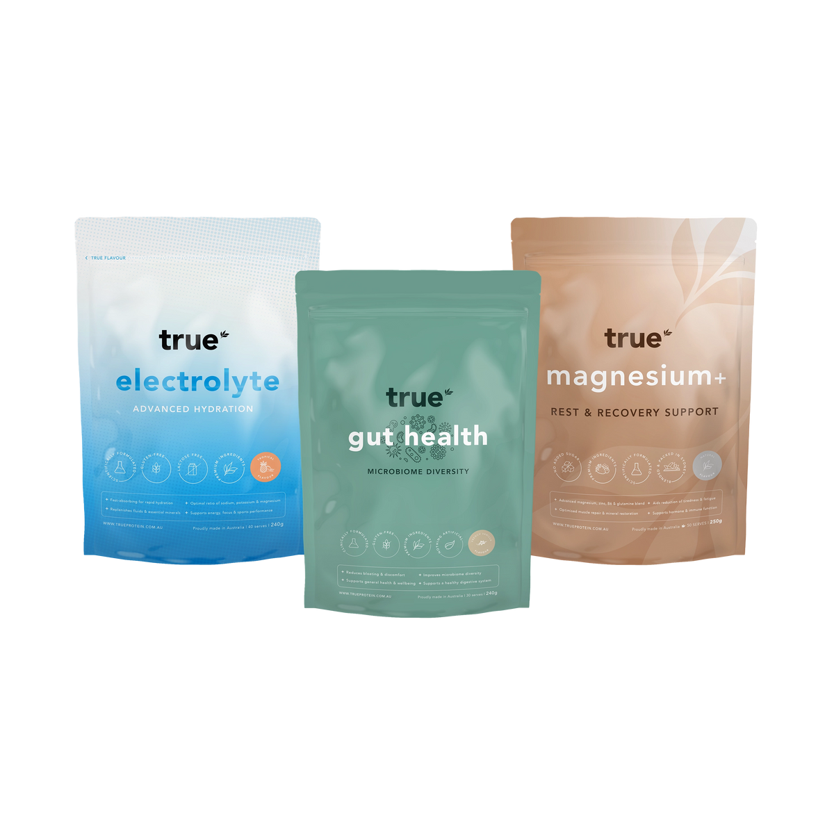 Three stand-up pouches of True supplement products on a plain white background: electrolyte in blue, gut health in mint green, and magnesium+ in warm beige.