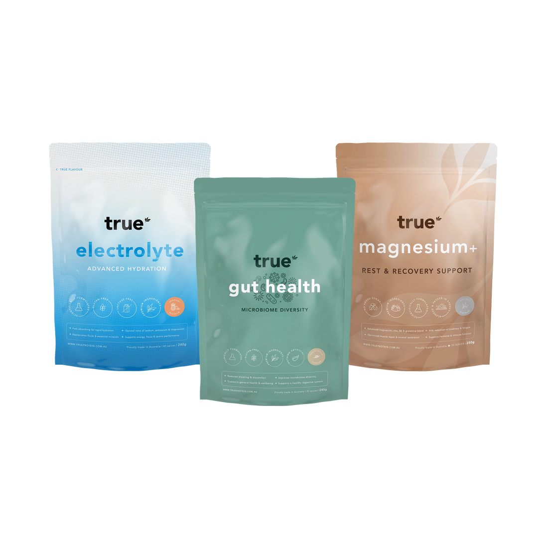 Three stand-up pouches of True supplement products on a plain white background: electrolyte in blue, gut health in mint green, and magnesium+ in warm beige.